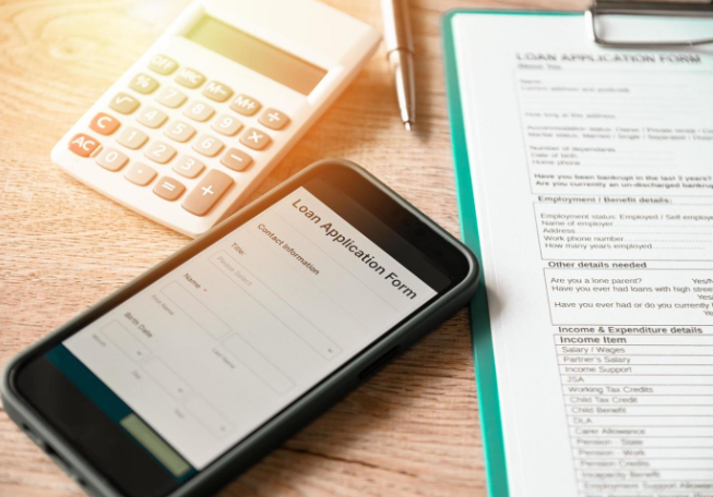 A phone with a loan application form.